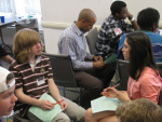 Youth strategize their lobbying agendas in preparation for meetings with their representatives' staff.