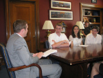 Youth from Boston MA meet with a staffer from Senator Scott Brown’s office to discuss how their representative’s priorities compare with their own.