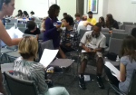 Youth strategize their lobbying agendas in preparation for meetings with their representatives' staff.